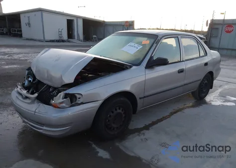 2000 Toyota Corolla Ce из США, поврежденный, VIN 1NXBR12E5YZ307385